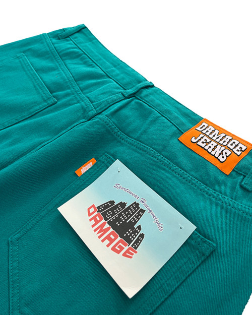 DAMAGE ORANGE TAB JEANS