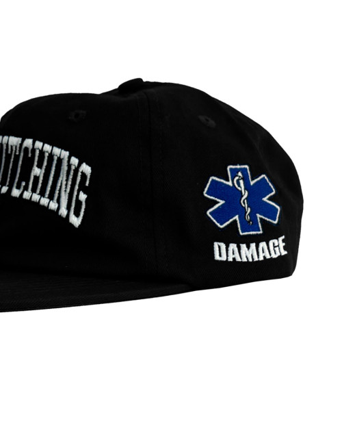 gorra damage snitching de color negro