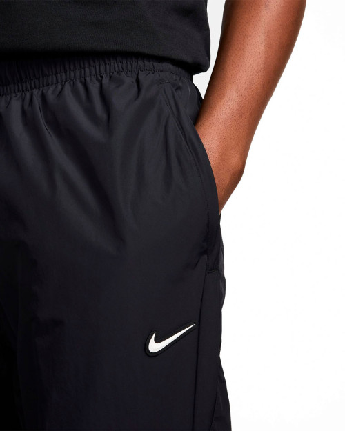 pantalon de chandal nylon drake nocta x nike negro